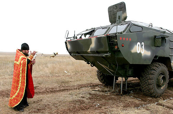 Priest Blessing Armored Vehicle