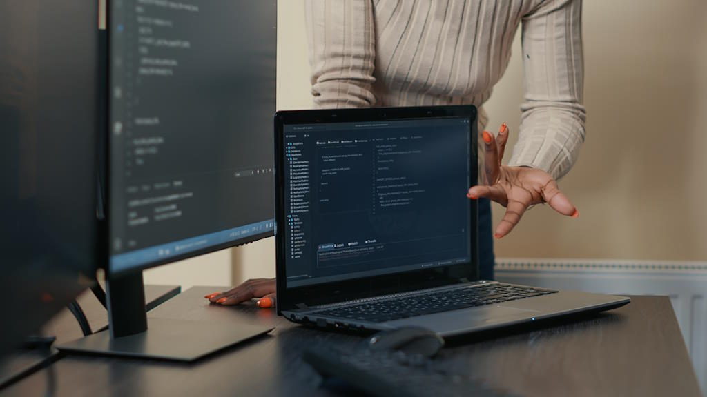 Specialist at a computer coordinating streams with a live casino software provider